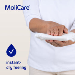 MoliCare product with a person using it, featuring the MoliCare logo and text.