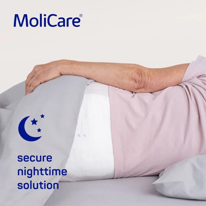 MoliCare product with a person lying down, featuring the brand logo and tagline.