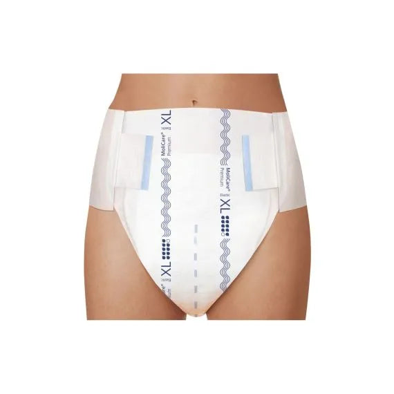 White incontinence diaper worn by a person on a white background