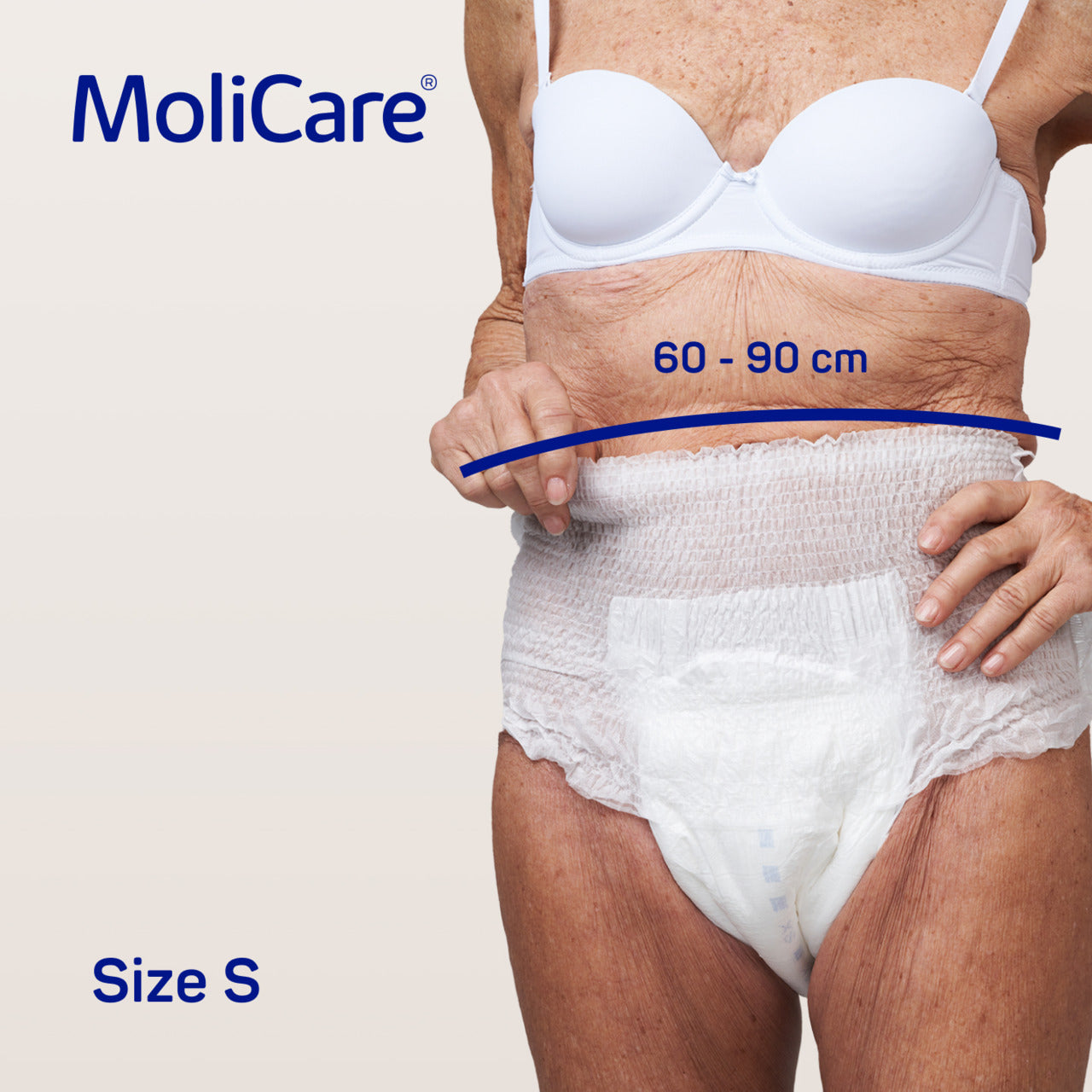 MoliCare product showing size S measurement on a person's waist.