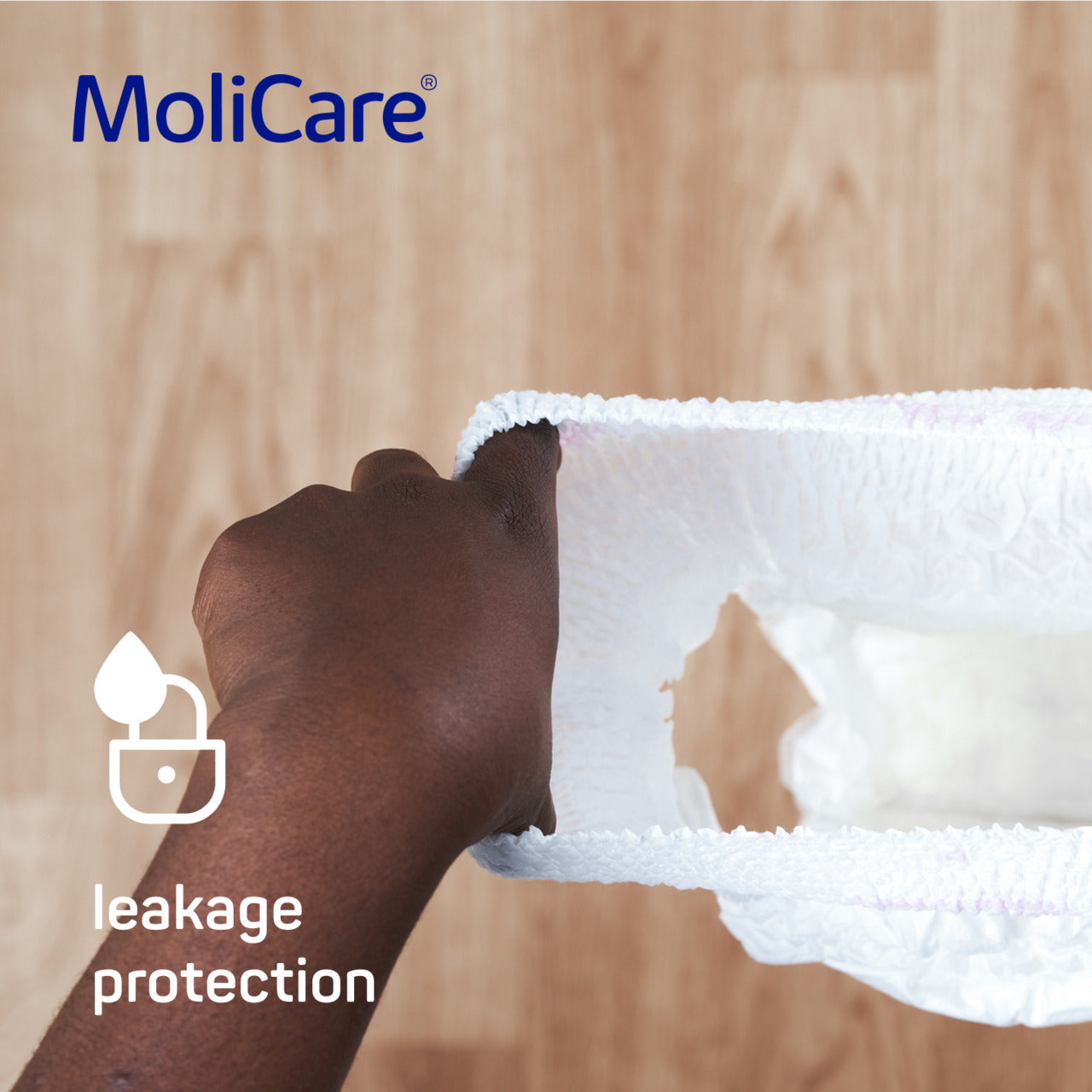 MoliCare product with leakage protection feature on a wooden background
