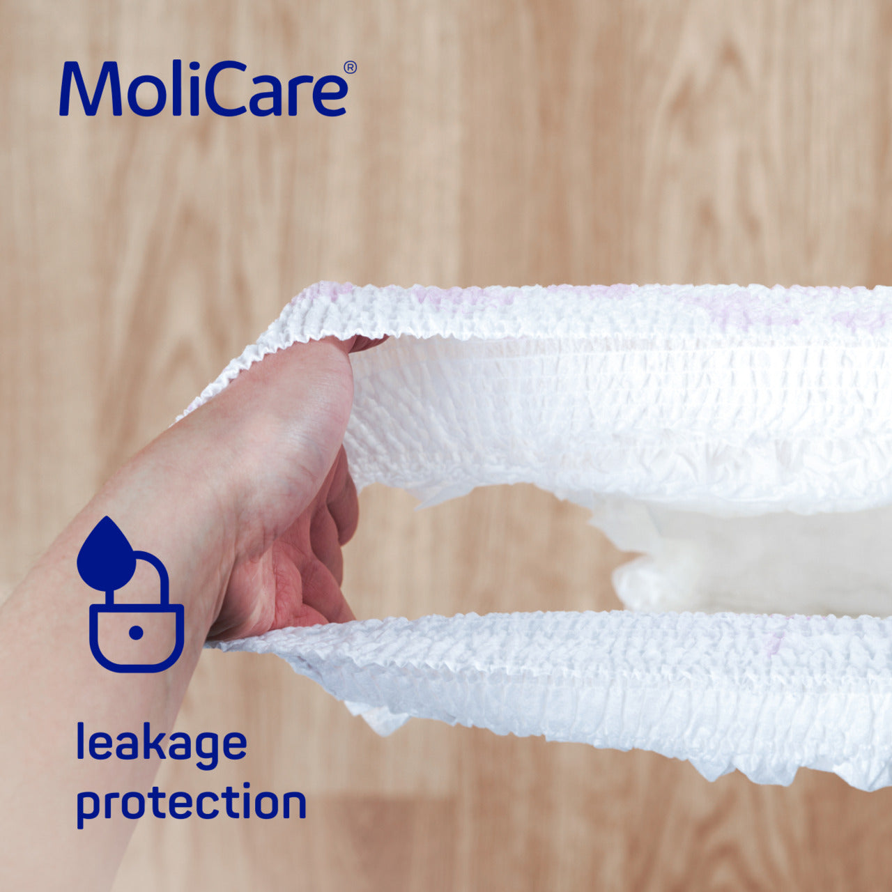 MoliCare product with leakage protection feature on a wooden background