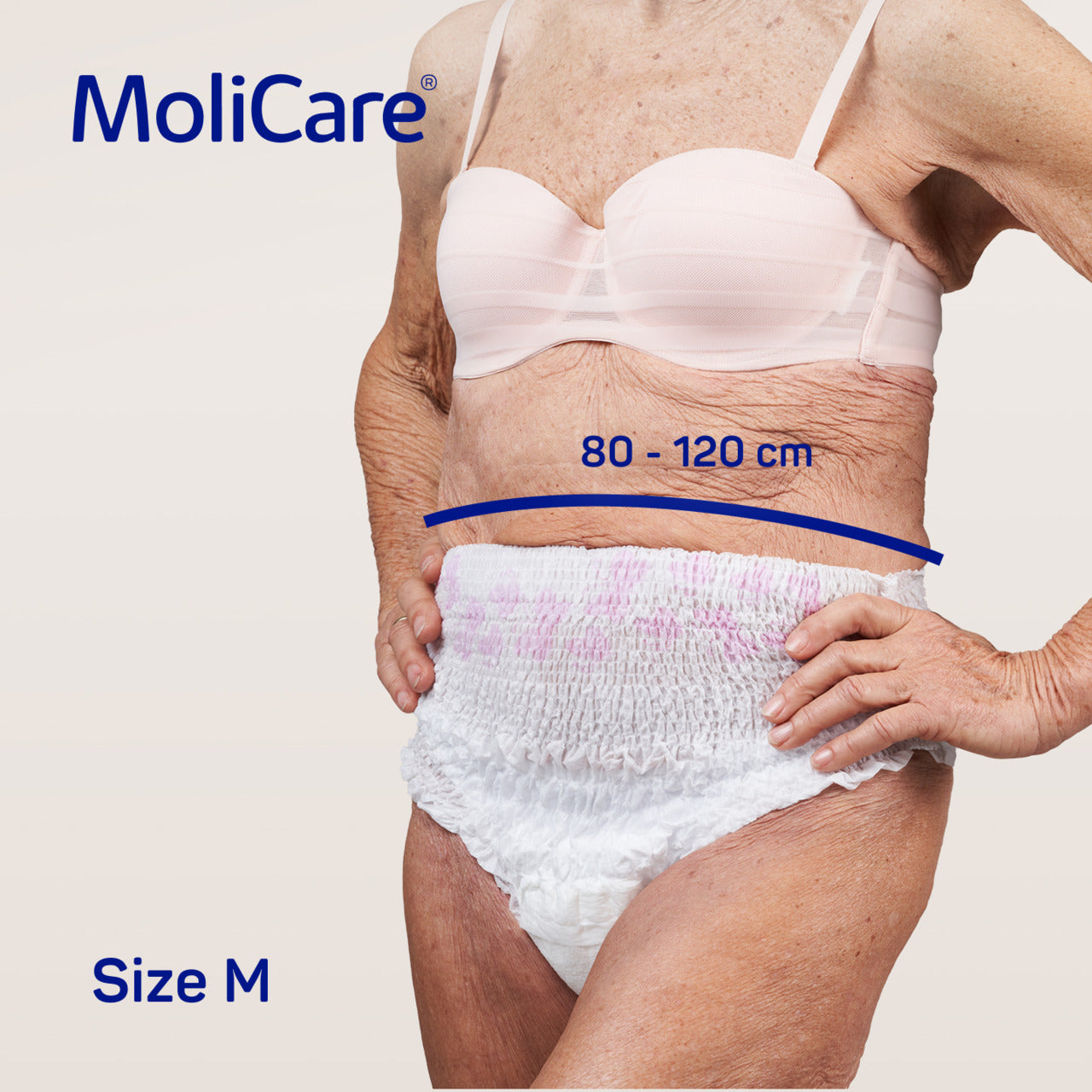 Person wearing MoliCare adult diaper with size measurement indicated.