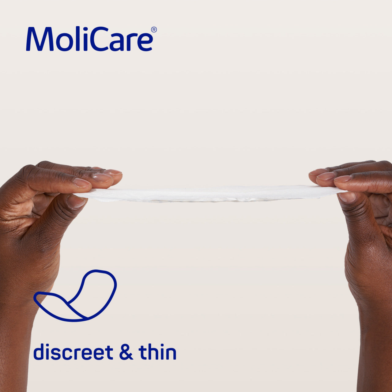 MoliCare product with hands holding it, emphasizing 'discreet & thin' on a light background.