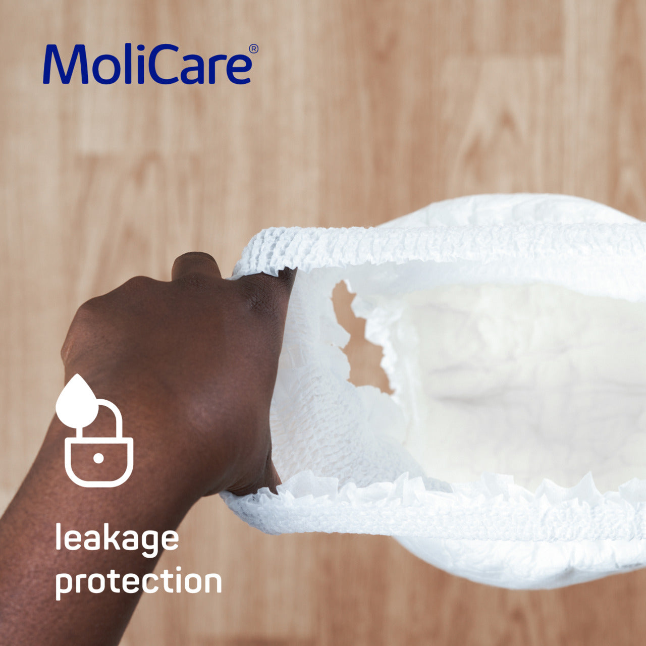 MoliCare product with leakage protection feature on a wooden background