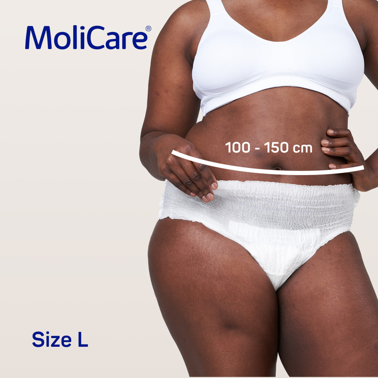 Person wearing a white MoliCare product with a measurement label on a plain background