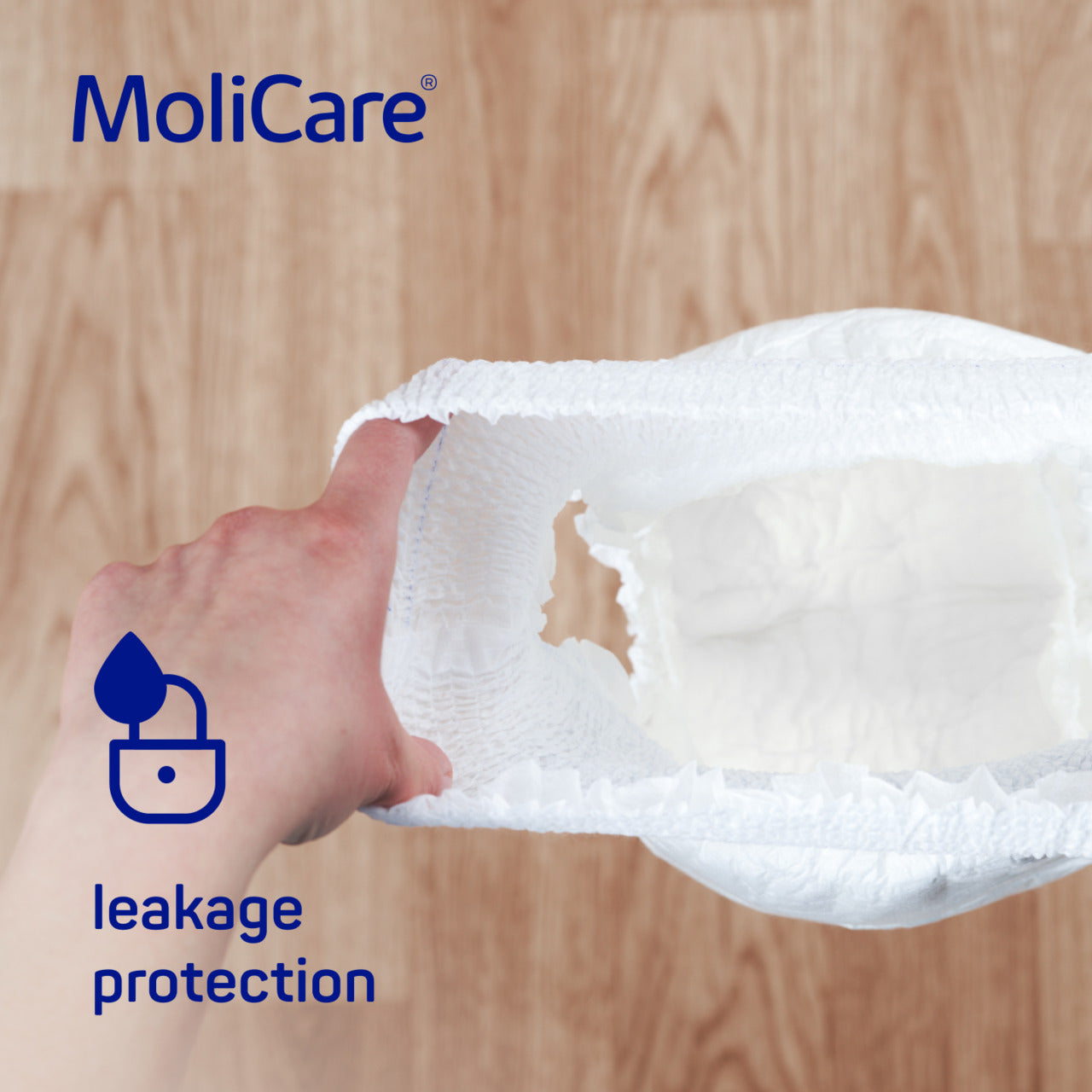 MoliCare product with leakage protection feature on a wooden background