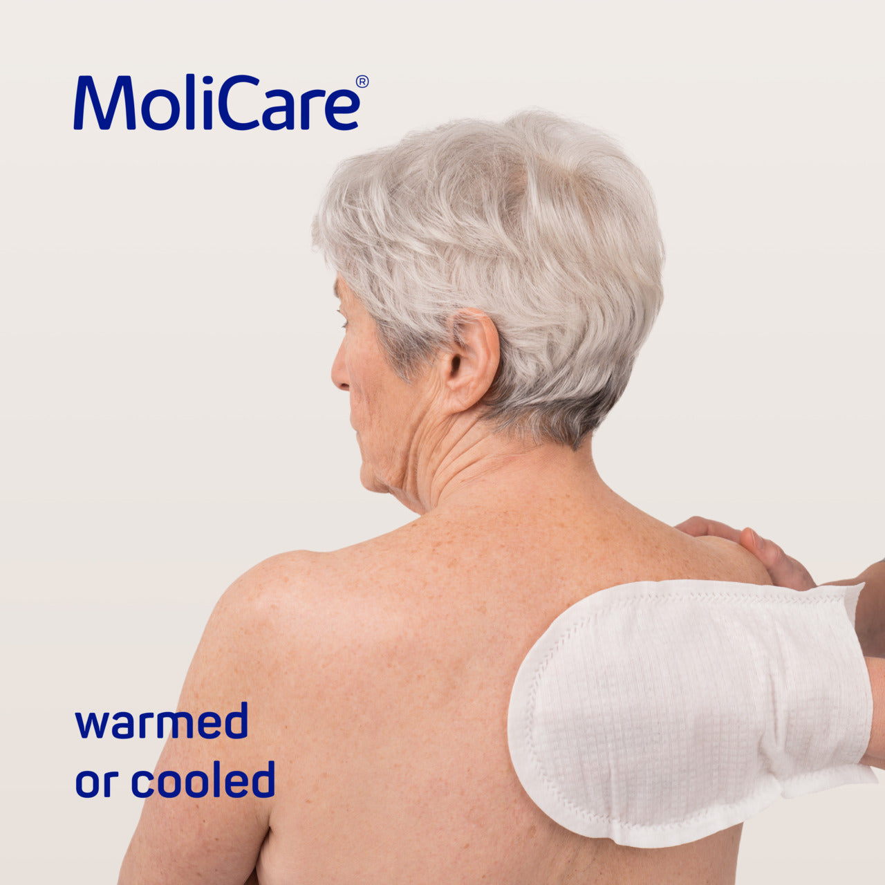 Person with a MoliCare product on their shoulder against a light background