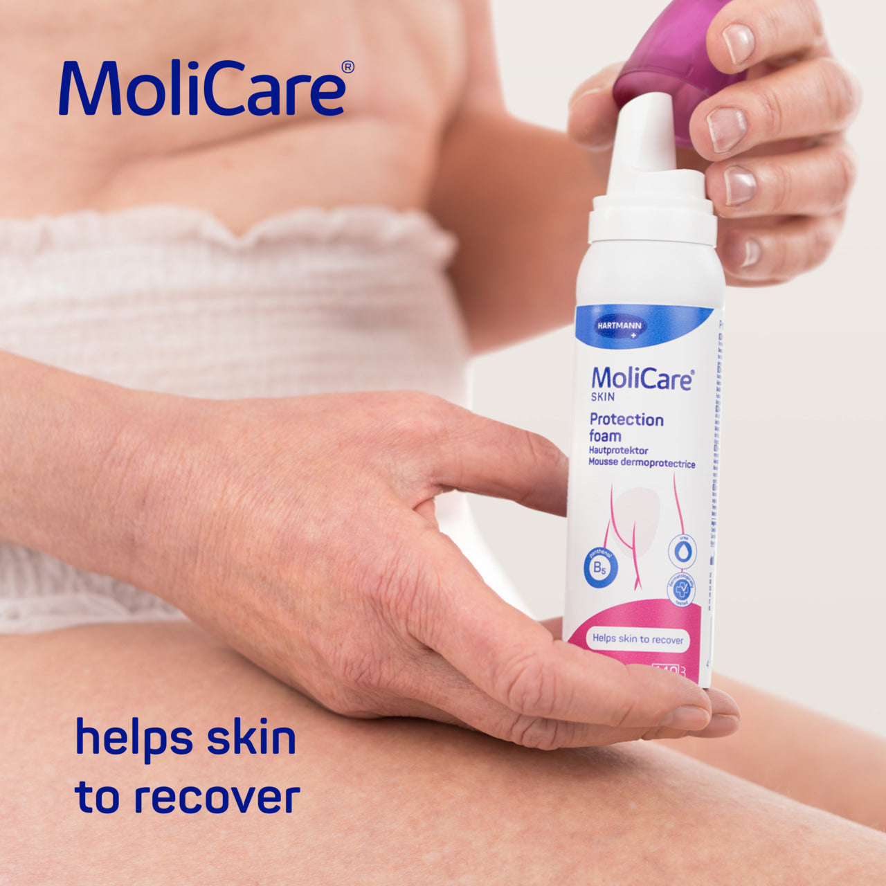 MoliCare foam being applied to a person's skin with the brand name displayed.