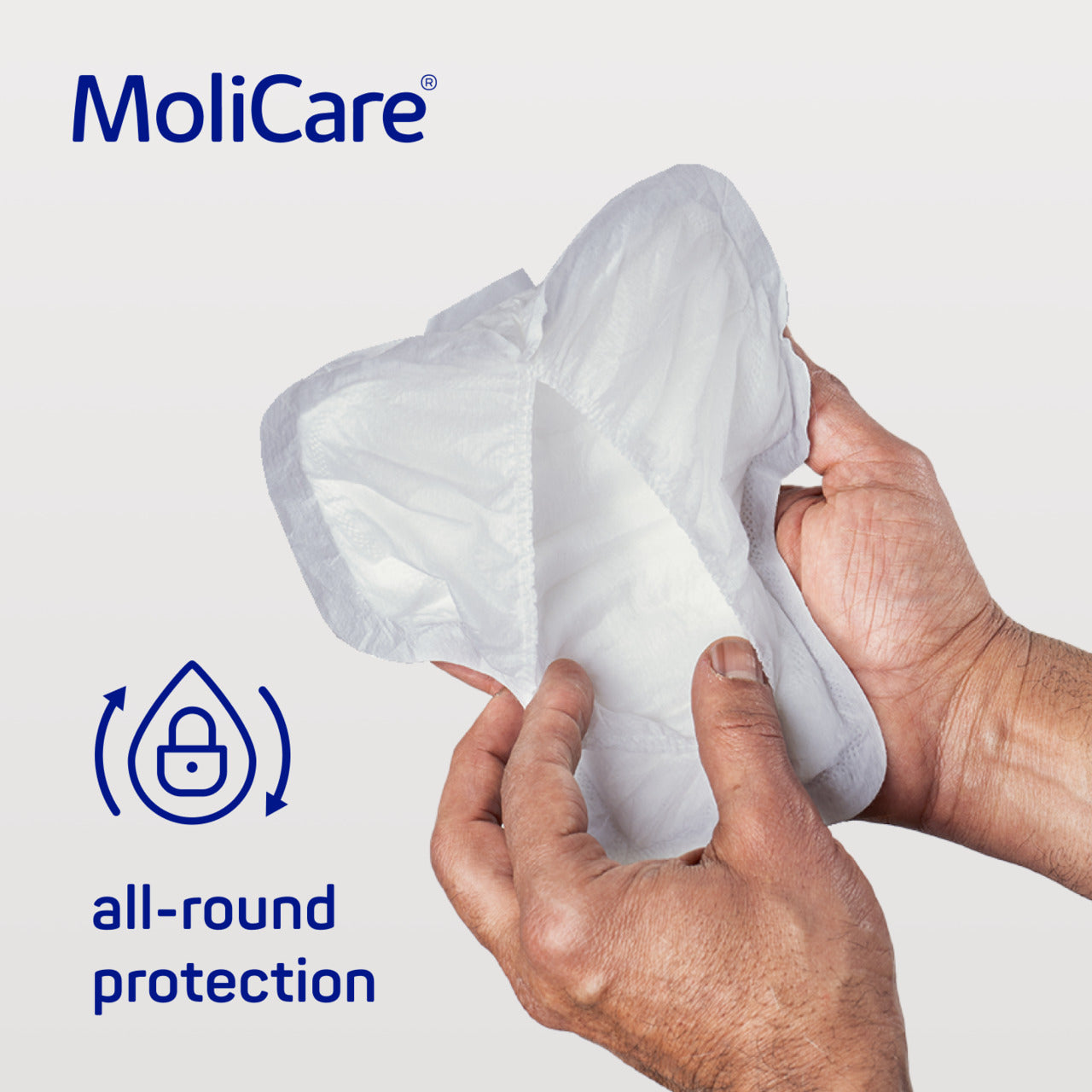 MoliCare product with hands holding it, emphasizing 'all-round protection' on a light gray background.