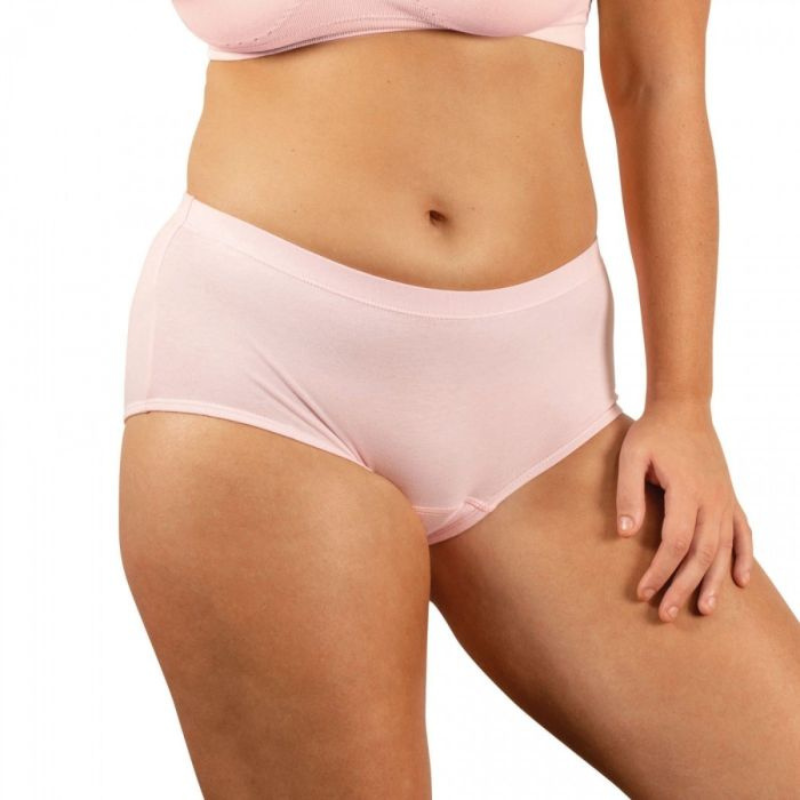 Person wearing light pink underwear on a white background