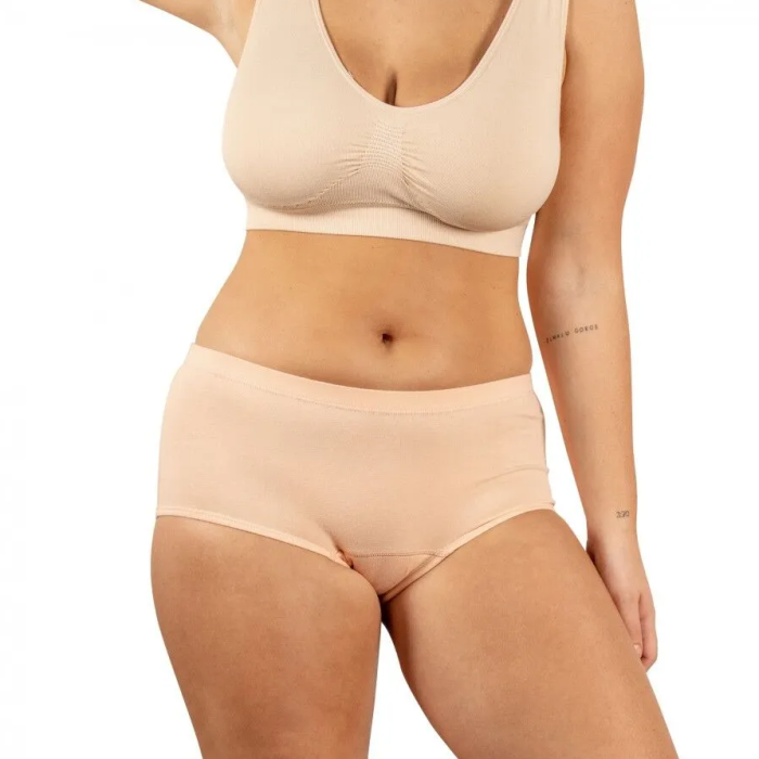 Beige bra and panties set on a white background