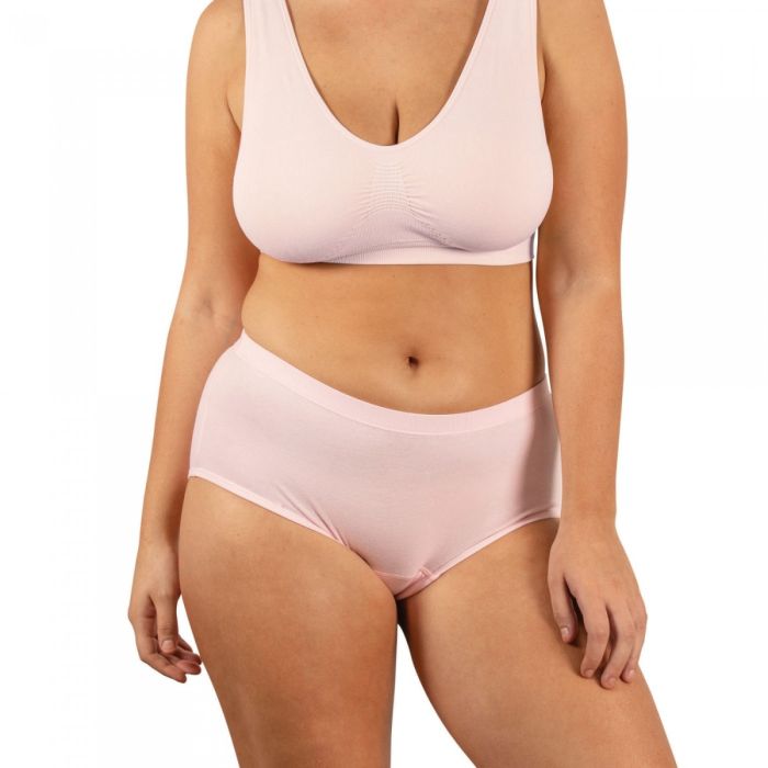 Person wearing a light pink bikini set on a white background