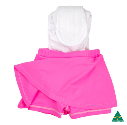 Pink athletic outfit with a white top on a white background